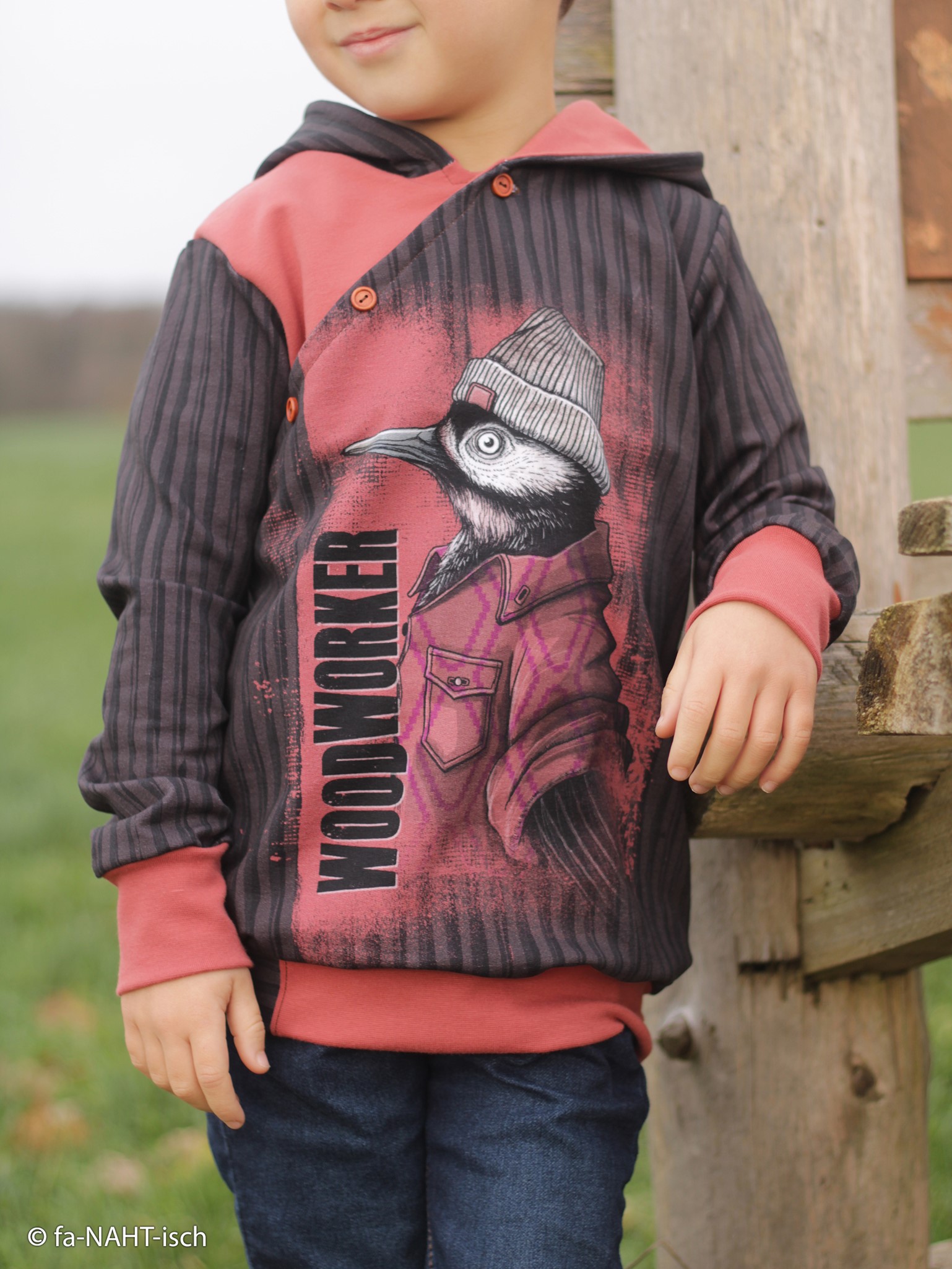 Bild von Baumwolljersey Sweat Specht auf Streifen braun schwarz 